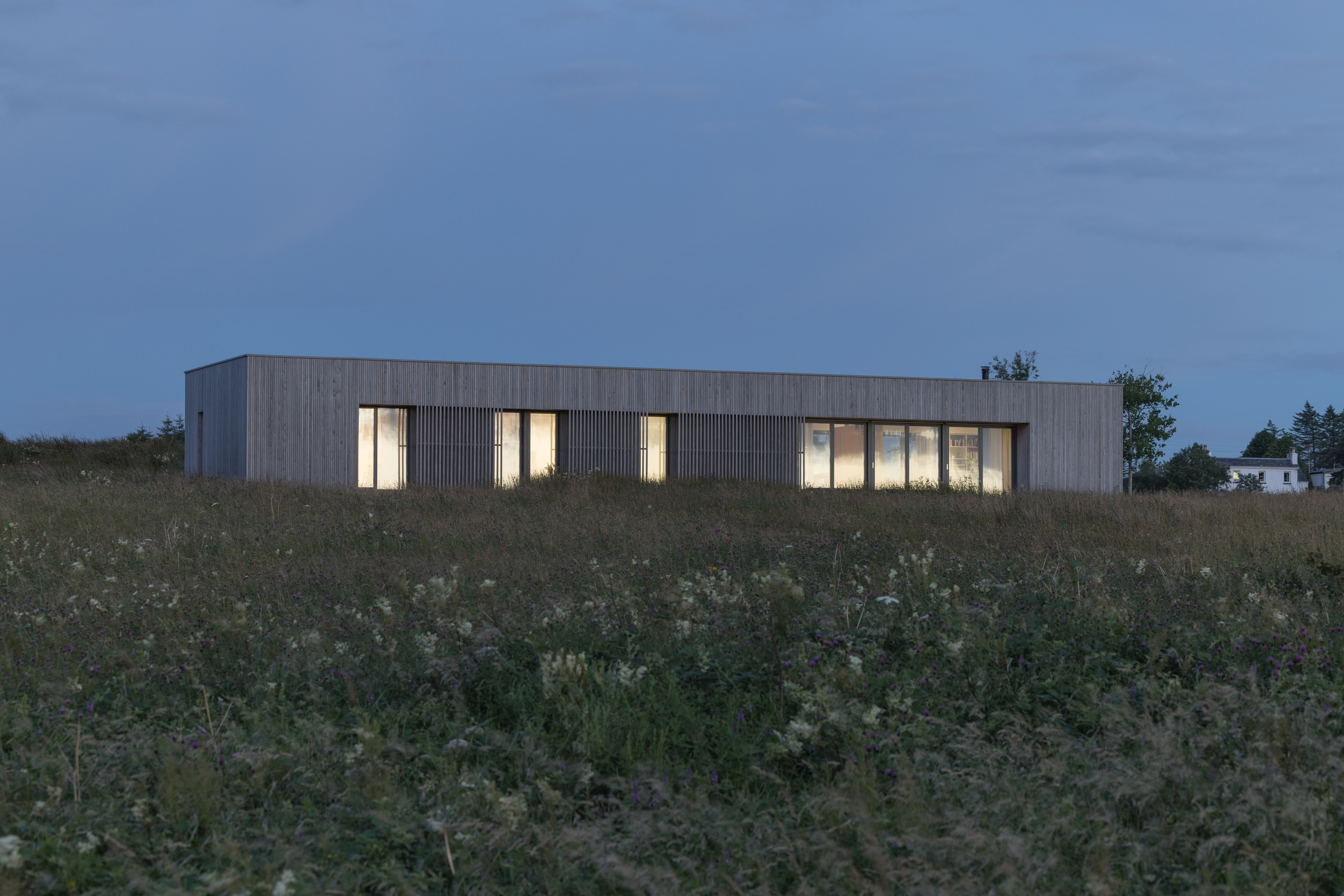Half of Eleven — long elevation at dusk