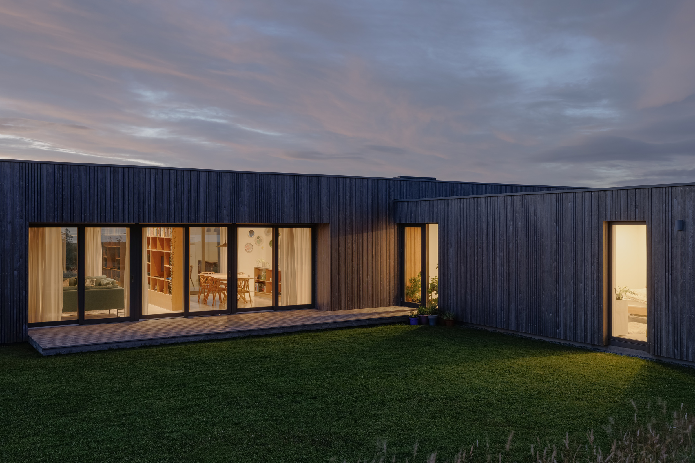 Half of Eleven — sheltered courtyard at blue hour